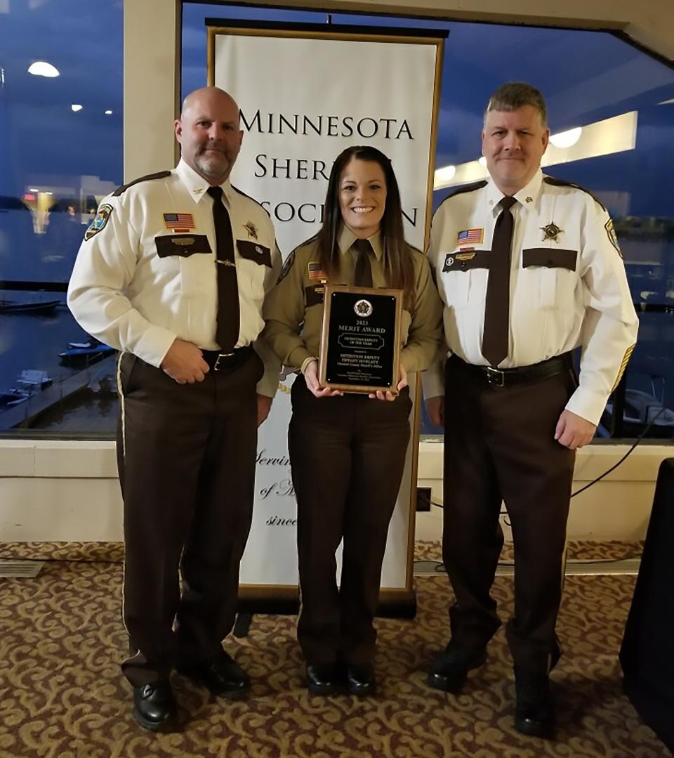 Detention Deputy Tiffany Howlett with Chief Deputy James Schueller and Sergeant Ted Maeder