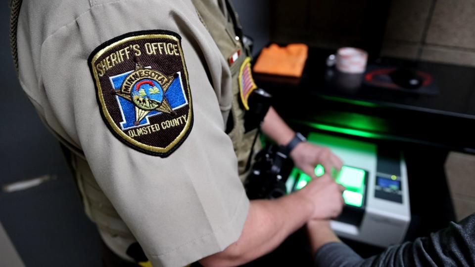 Sheriff's Office employee finger printing